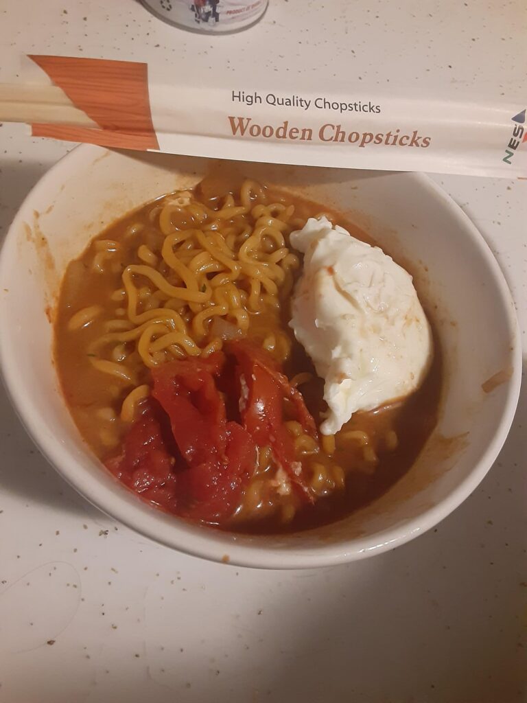 Tomato buldak with onion, American cheese and chocolate chips to even out spice level and only 3/4 of sc pack cuz I'm a puss