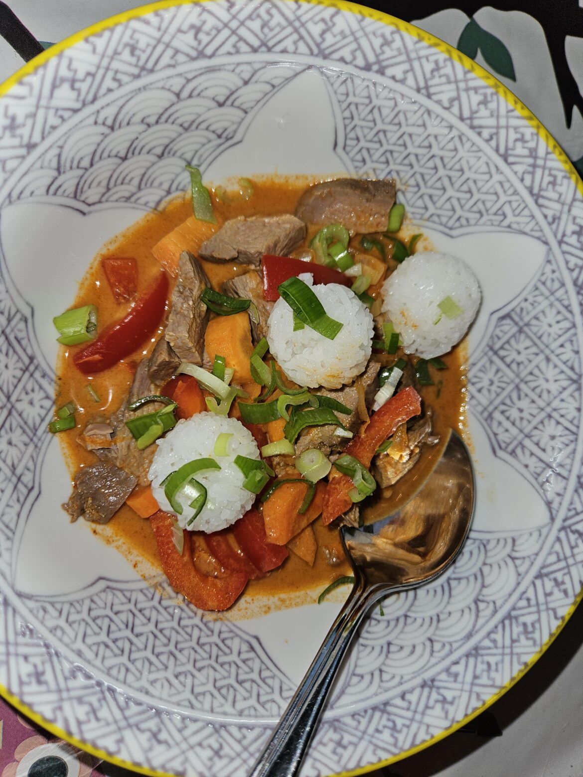 Duck breast, carrots, and red bell pepper in Thai red curry. The little lady prepped some rice balls to go with it...