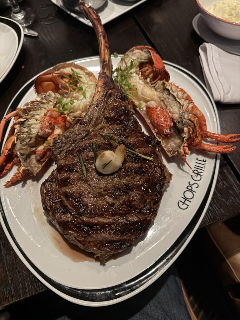 32oz USDA Prime Angus Tomahawk, with a 1.5lb Boiled Maine Lobster.