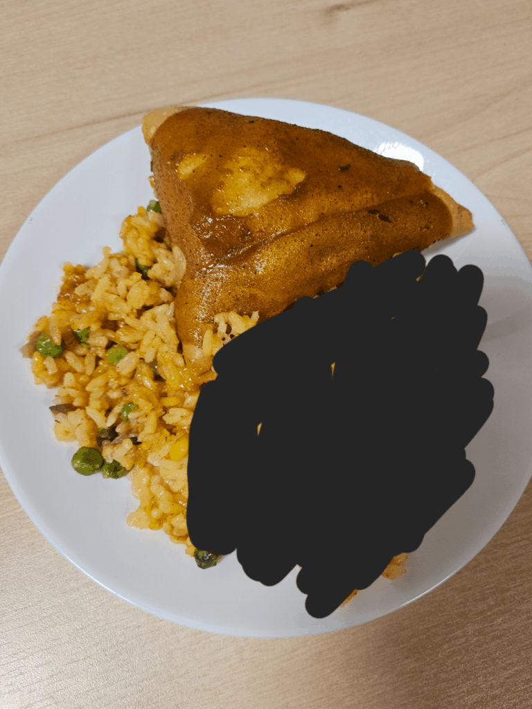 How many calories in the samosa and rice?