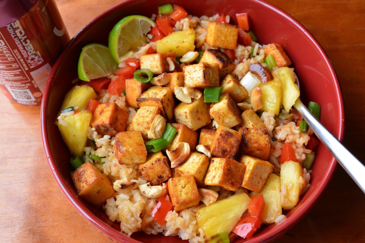 pineapple fried rice with Thai red curry tofu (450 cal, 29 P)