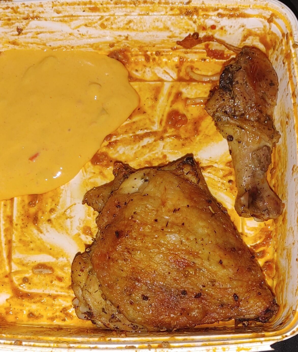 Expired chicken seasoned with pretty much nothing with queso for dipping served in a container I couldn't be bothered to wash from last night's spaget.