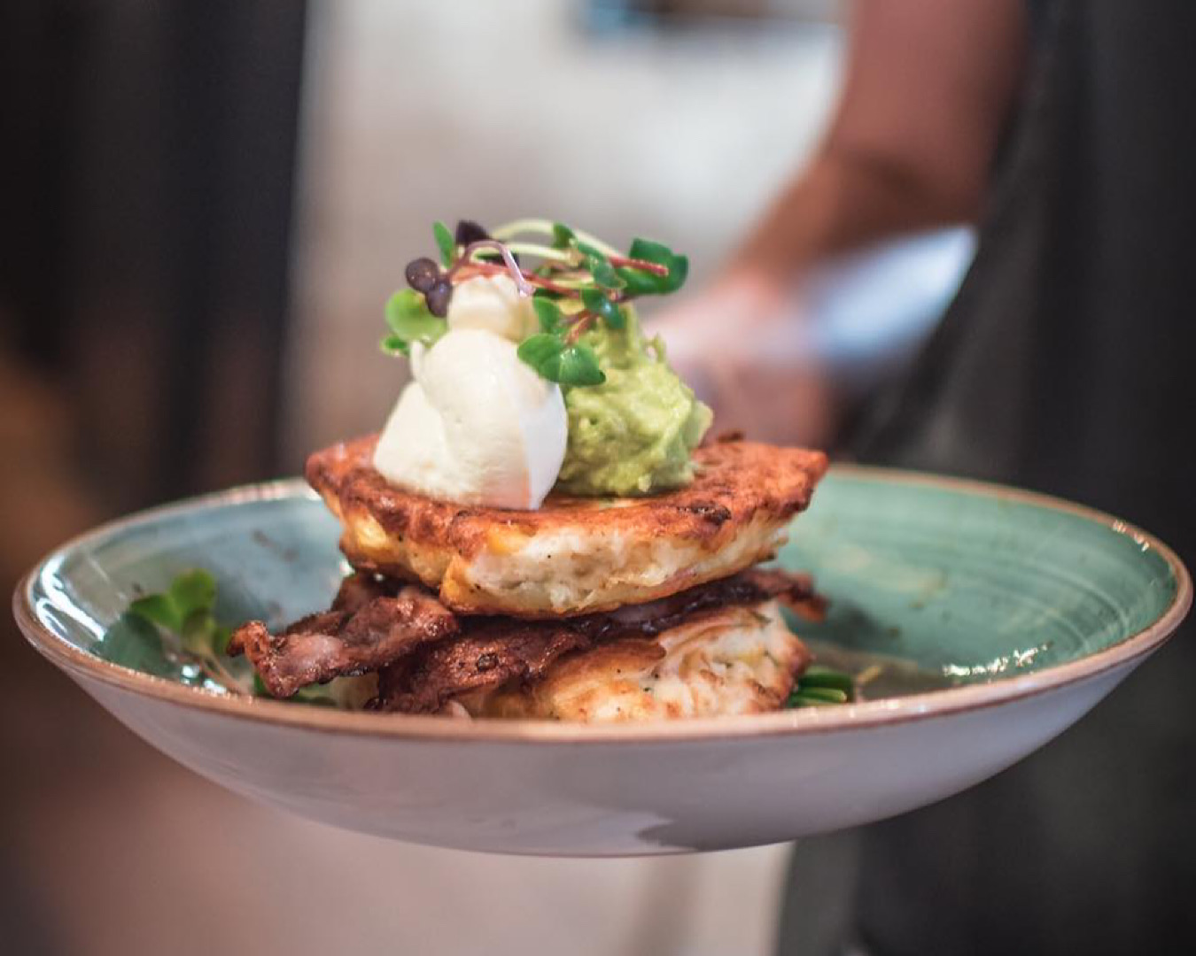 A serious stack of corn fritters, fit for gluten-free diners. 