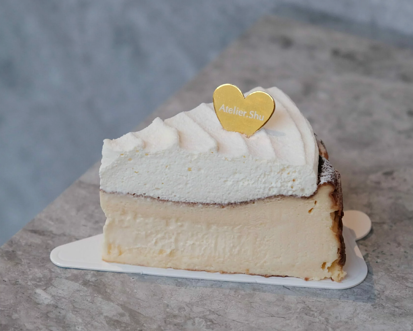 A slice of incredibly creamy and incredibly gluten-free cheesecake by Atelier Shu. 