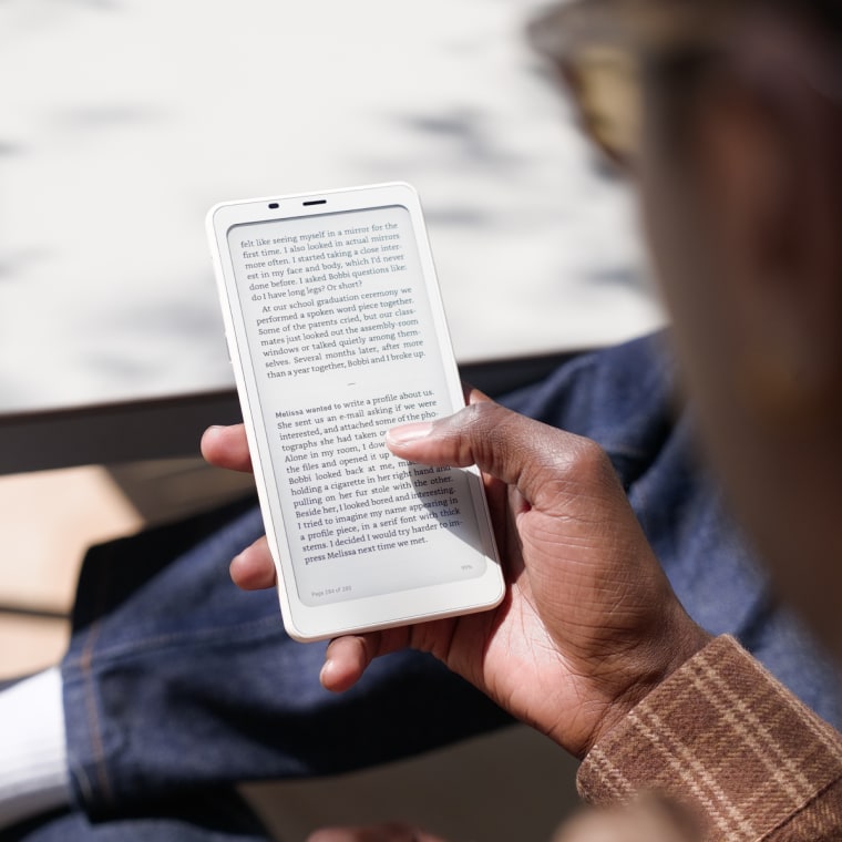 A close up of the Boox Palma 2 in the hand of NBC Select commerce editor Jordan Bowman.