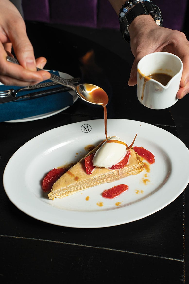 Crêpes Flambé layered with blood-orange cream at Madame in Jersey City. 