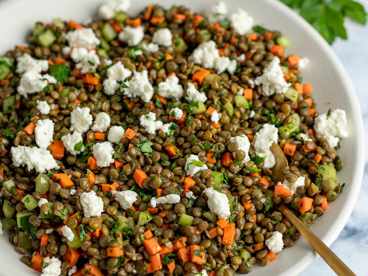 lentil salad in white bowl.
