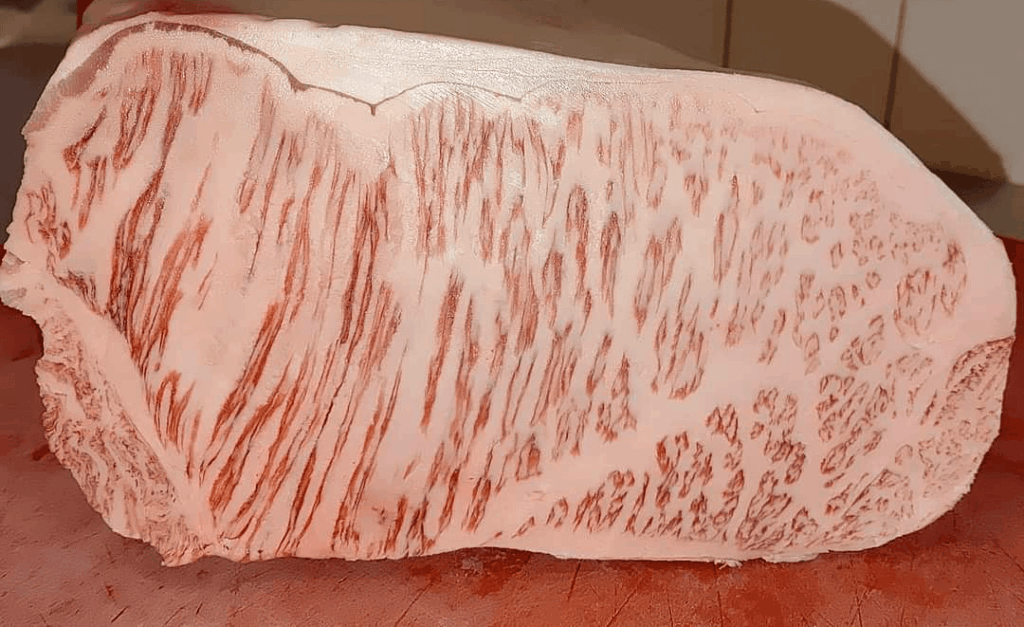 Some A5 Wagyu we were cutting around Christmas at my shop. Thought you guys would appreciate it.