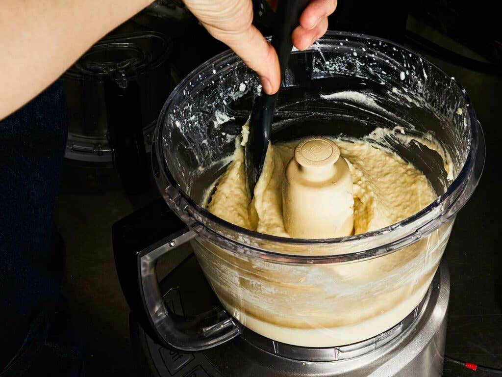 A heavy-duty food processor replaces the traditional mortar and pestle.