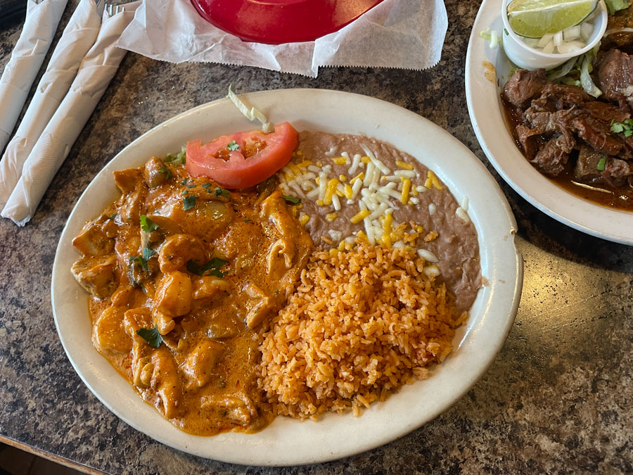 The chipotle chicken and shrimp entree served with beans and rice | Jordan Wood, EastIdahoNews.com