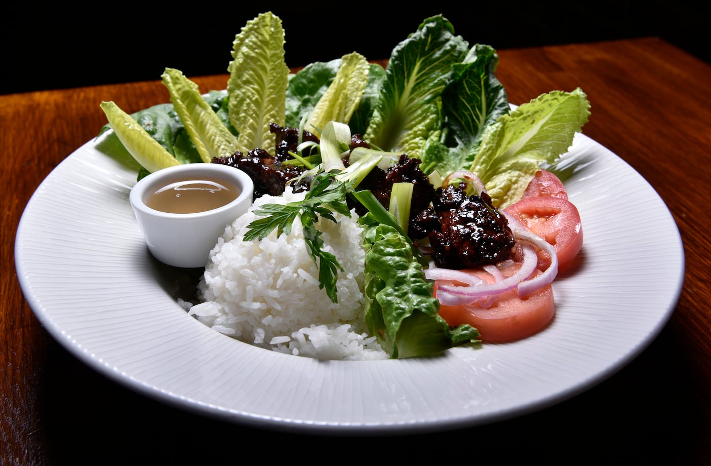 At the Elephant Walk in the South End, Cambodian dishes sit alongside French ones on the menu. Loc lac features peppery, caramelized beef tenderloin with rice, lettuce, and lime-garlic dipping sauce.