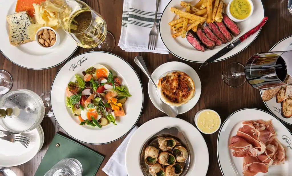 a menagerie of food laid out on the table at Bar Terroir in South Tampa.