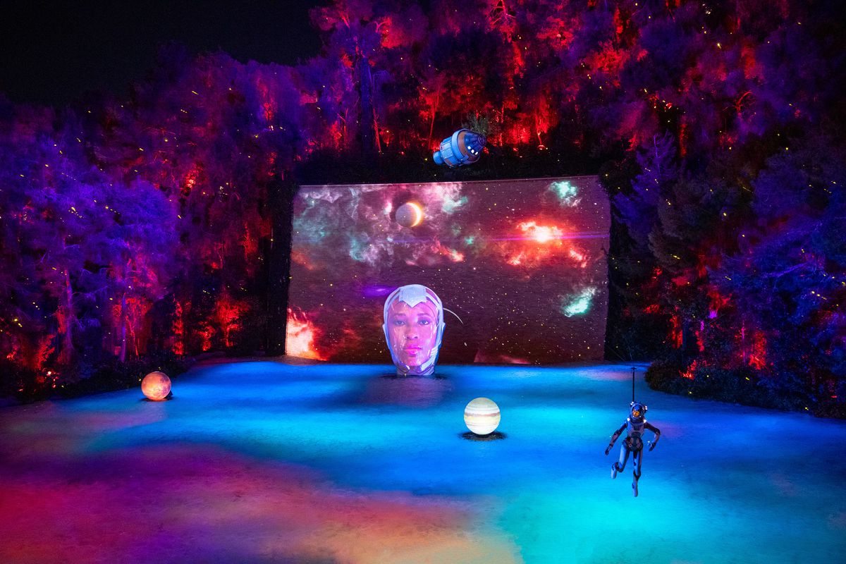 Wynn Lake of Dreams with floating orbs and an astronaut.