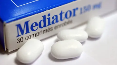 AFP A box and pills for the weight loss drug Mediator