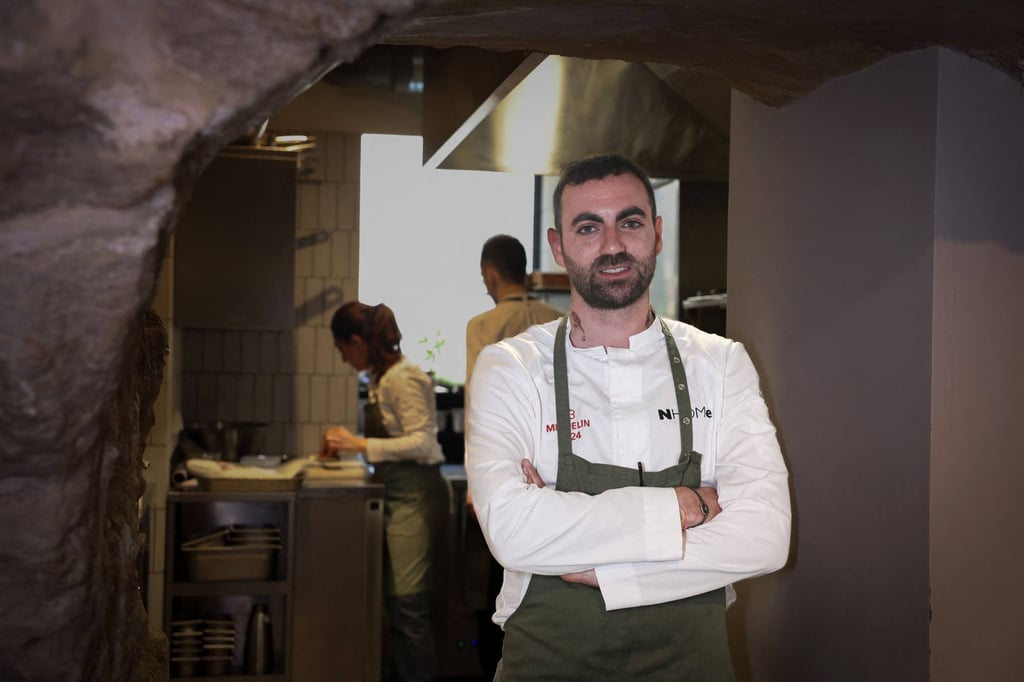 French-Israeli chef Matan Zaken at his restaurant Nhome in Paris. He embraces the use of ChatGPT in the kitchen. Photo: AFP