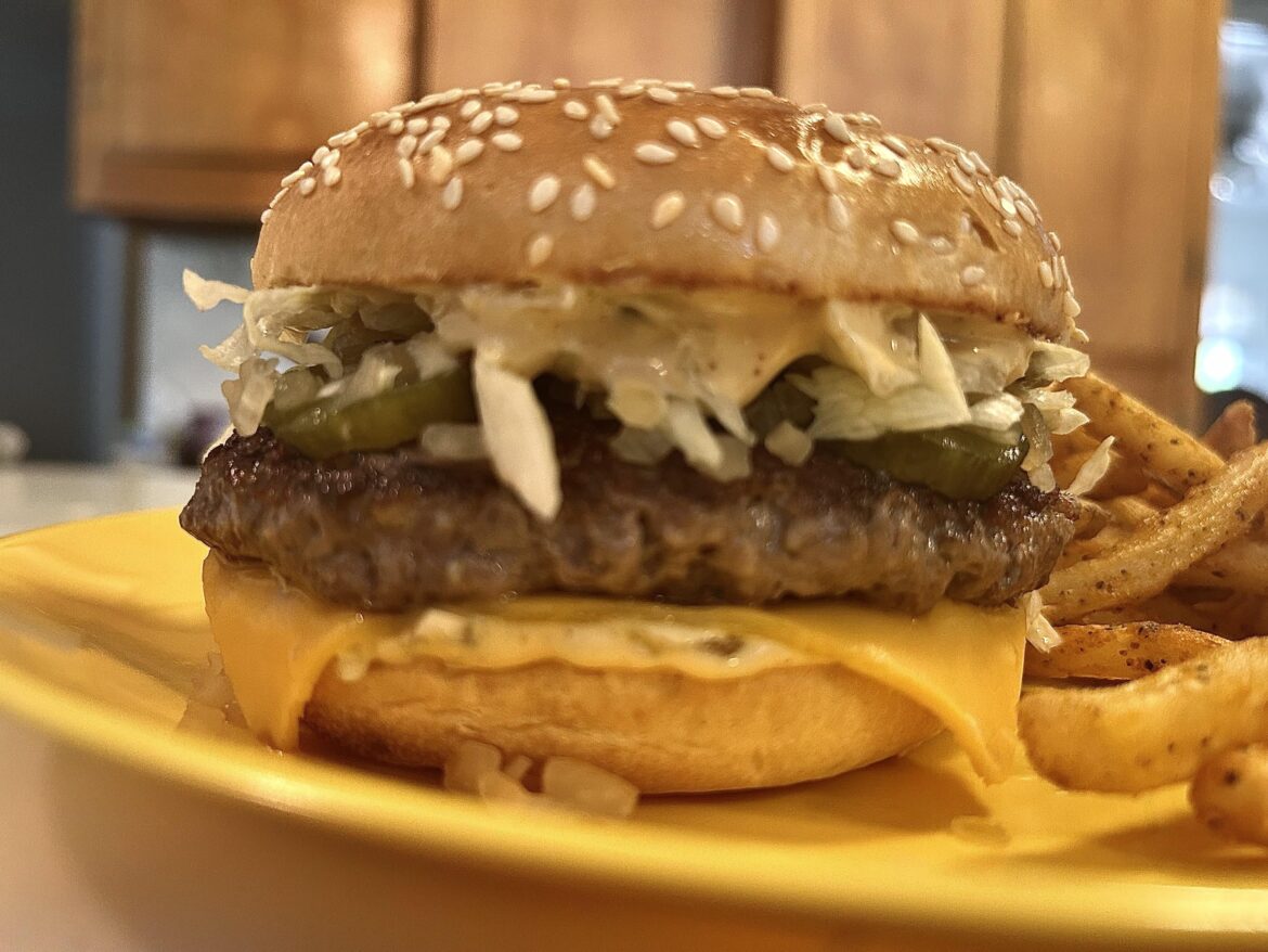 Royale w cheese dressed as le Big Mac at home