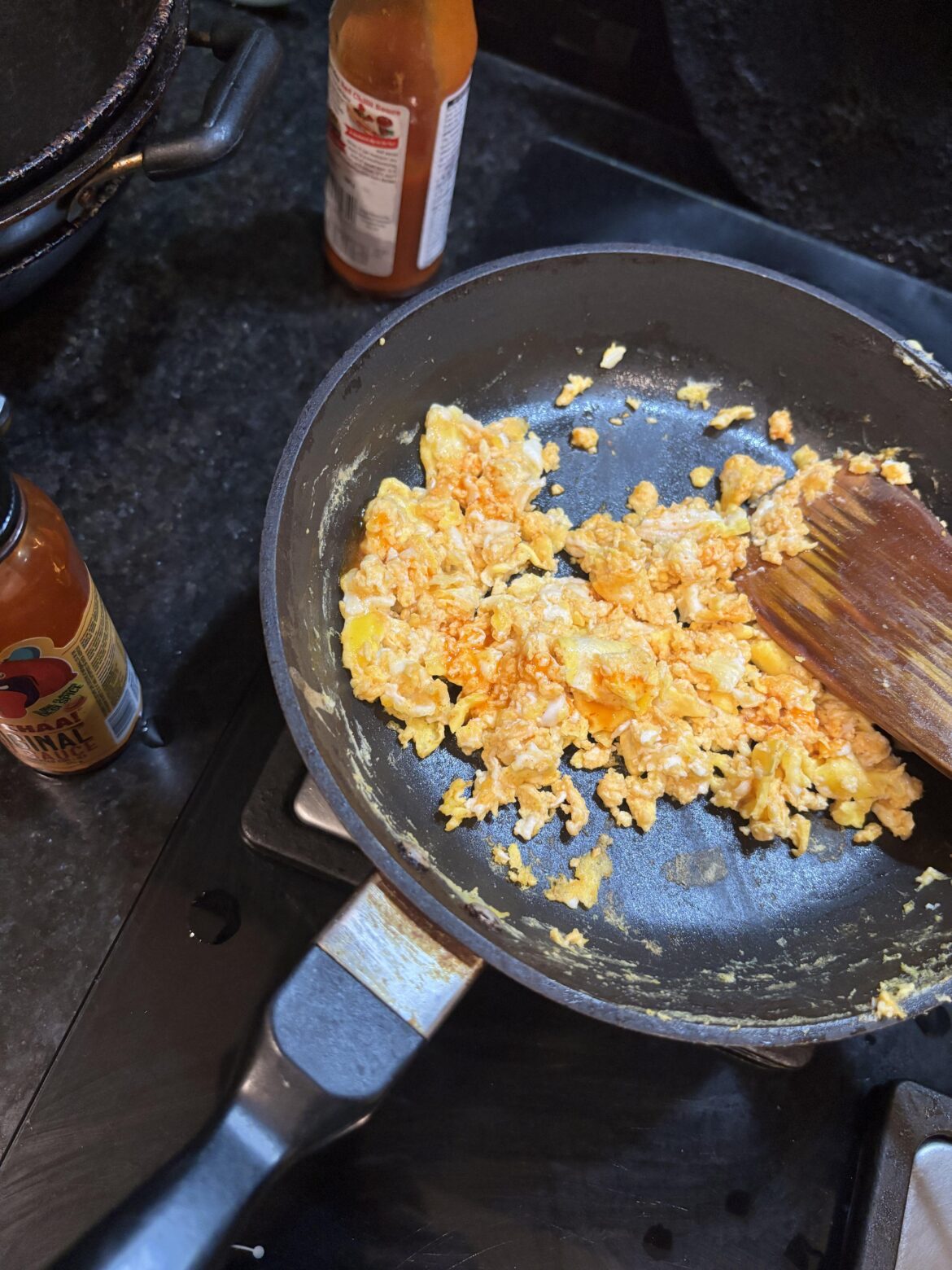 Does anybody else combine their sweet and spicy hot sauces while cooking? These eggs turned out pretty dang hot