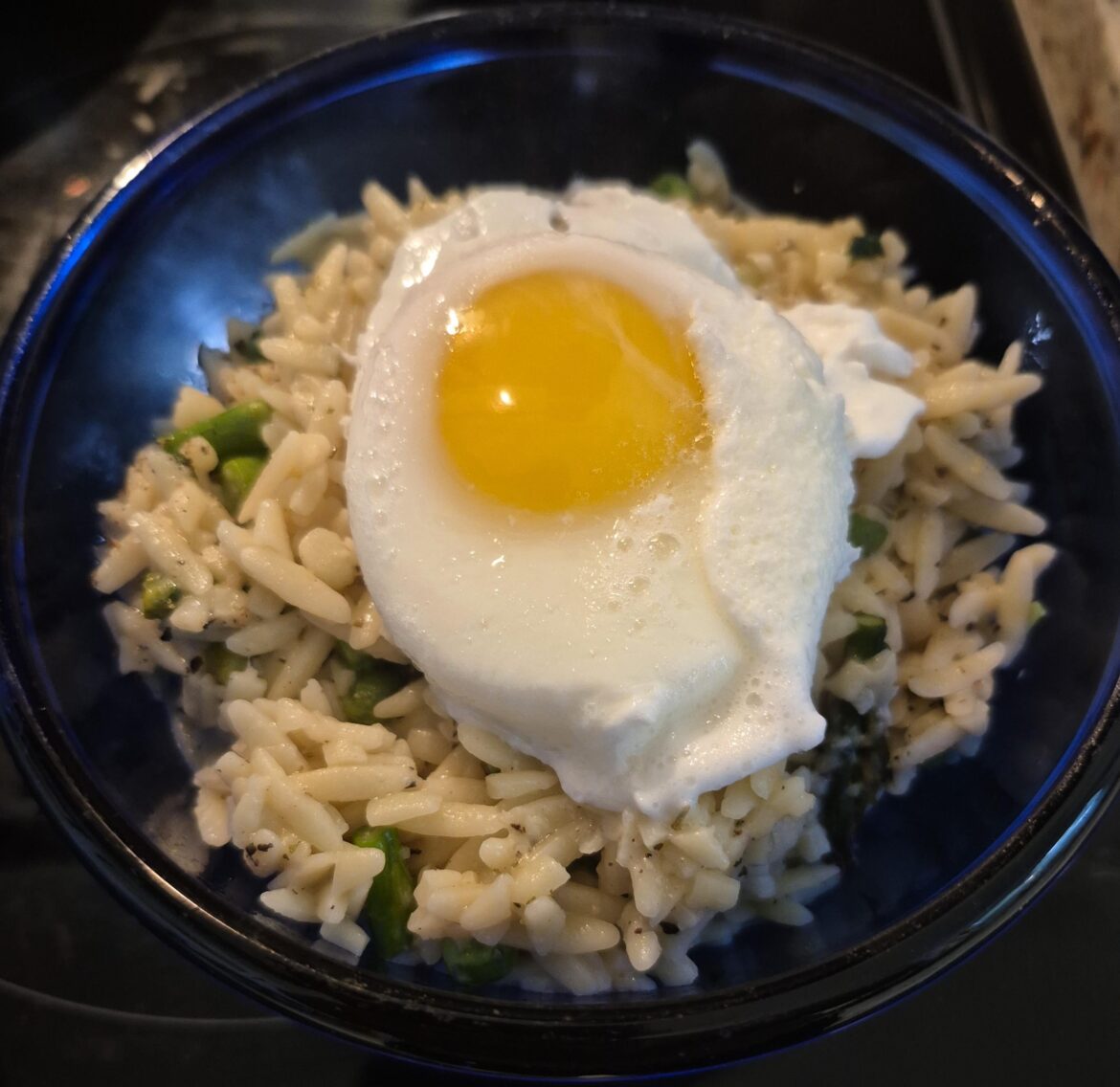 Made orzo for the first time! Asparagus, lemon, garlic, parm with a poached egg.