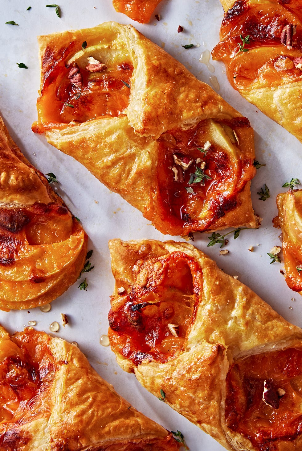 apple cheddar bundles with puff pastry honey pecans and thyme