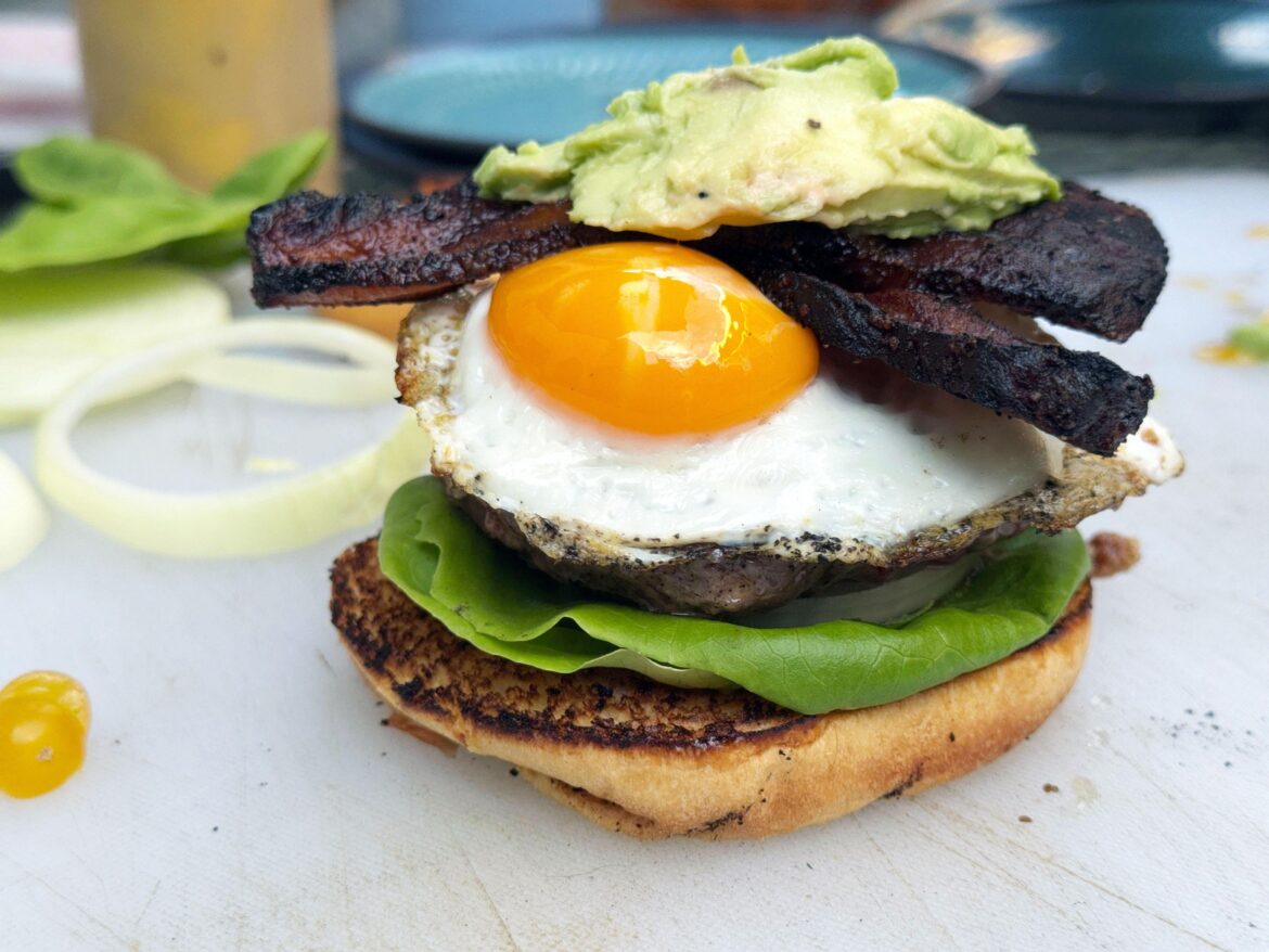 Chef Cutter's runny egg burger with Flat Cow Burger Bacon and avocado from OBGG  Kitchen pop up