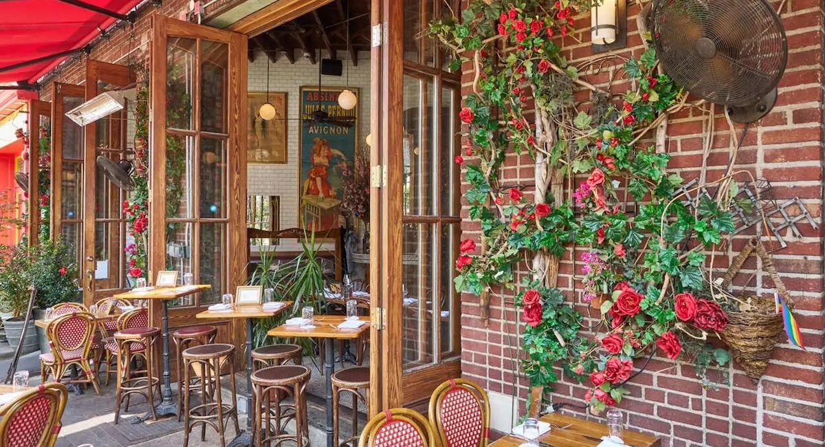 Cafe tables and open French doors of Boucherie West Village