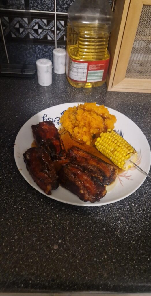 Maple glazed pork belly, sweet potato mash and corn on the cob, delicious.