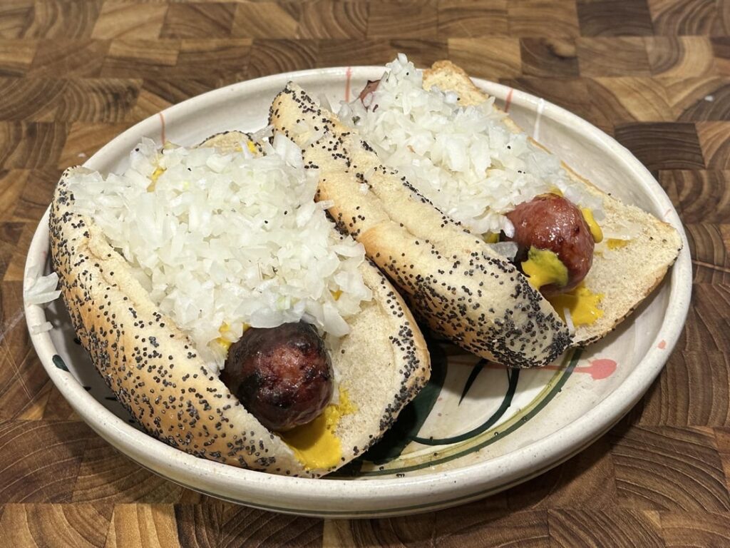 had about half an onion for dinner last night. decided to use brats as a vehicle.