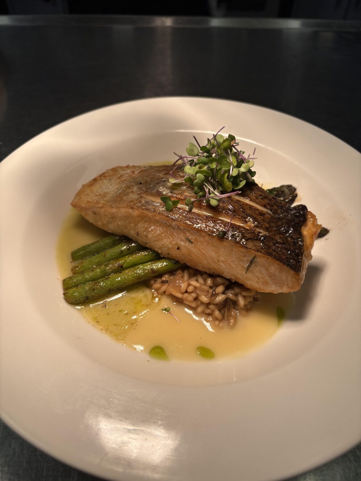 Salmon, asparagus, mushroom risotto, green oil beurre blanc