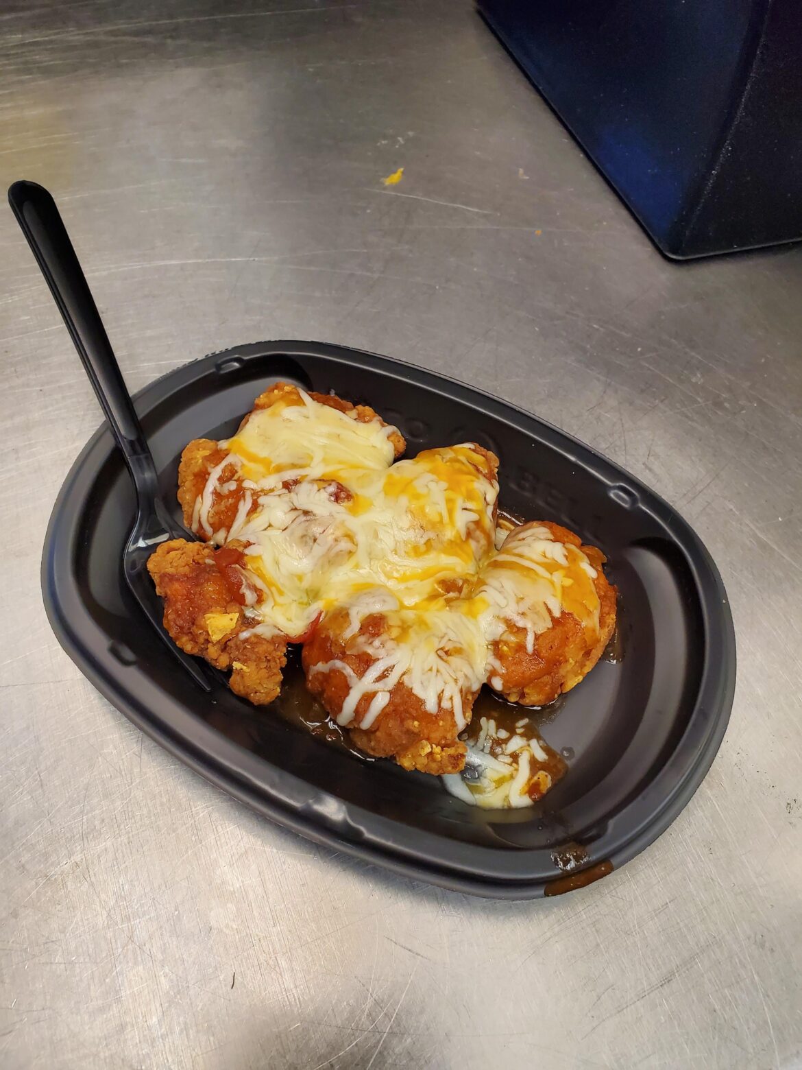 Bored at work ( Taco Bell ) so I made Chicken Parmesan using the Ingredients we had.