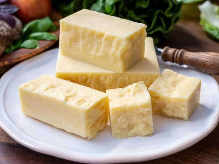 Blocks of cheddar cheese
