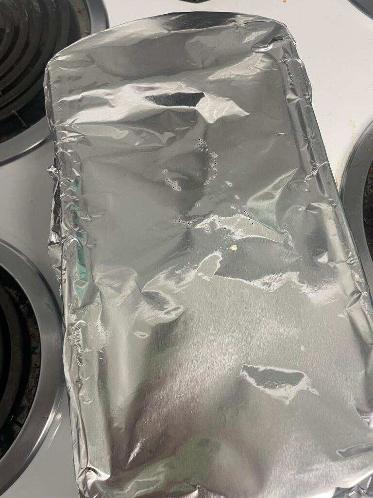 What on earth are these holes in my aluminum foil? Covering my banana bread