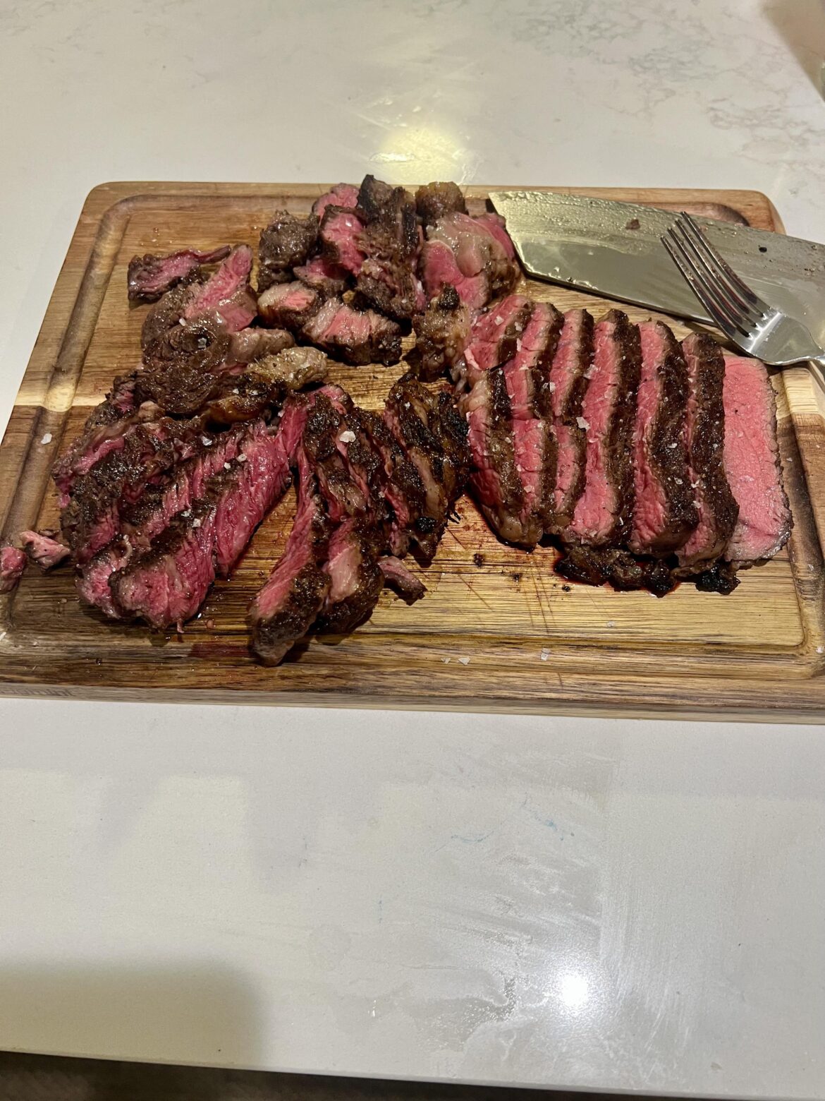 Grass fed ribeye over charcoal on the Tromen Federal