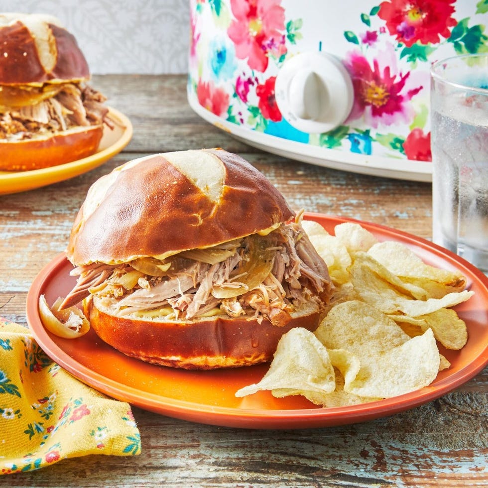 slow cooker pulled pork on sandwich with chips