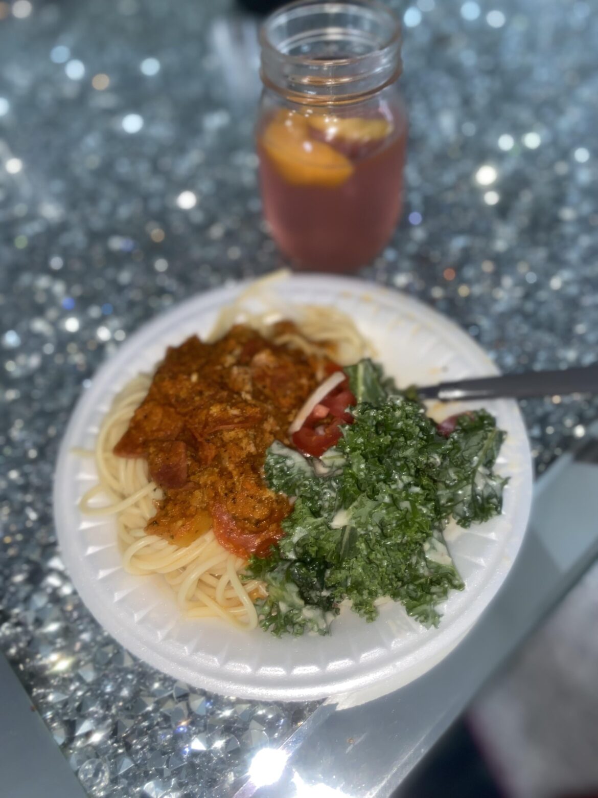 Homemade spaghetti and Caesar salad