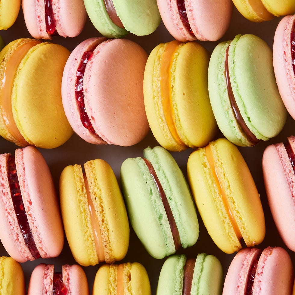 pink, green, and yellow macarons lined up together
