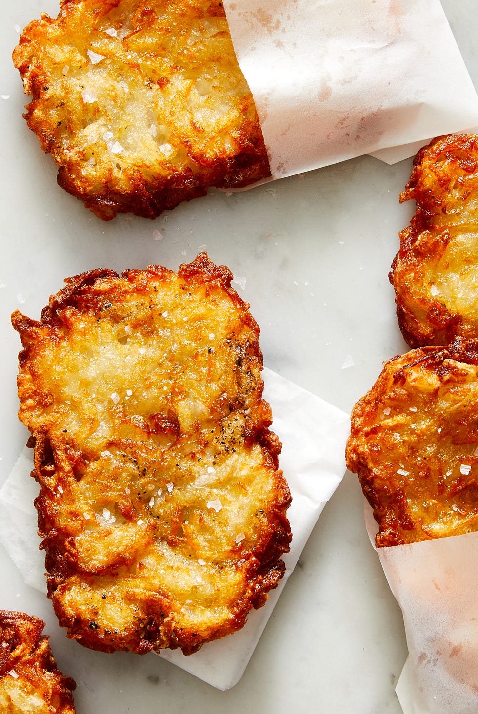 copycat fried and crsipy mcdonalds hash browns for breakfast with with ketchup on side