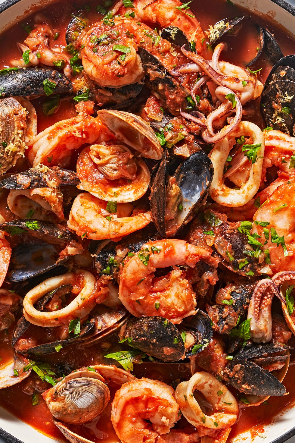 zuppa di pesce with mussels clams shrimp squid tomato white wine andgarlic
