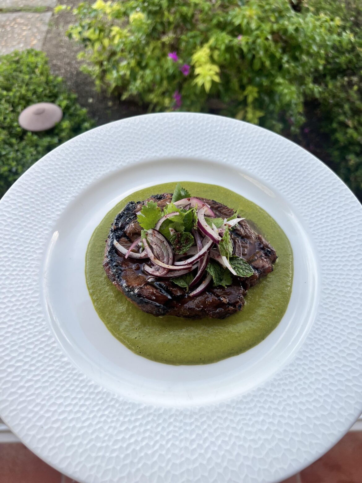 Smoked, Tamarind Glazed Leg of Lamb with Aji Verde, and Sumac Red Onions
