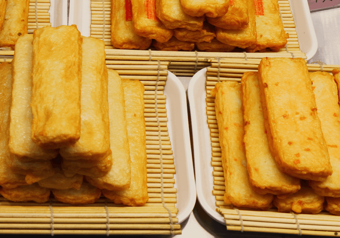 What is the name of this food? Rectangular Korean cakes (?) at a market.