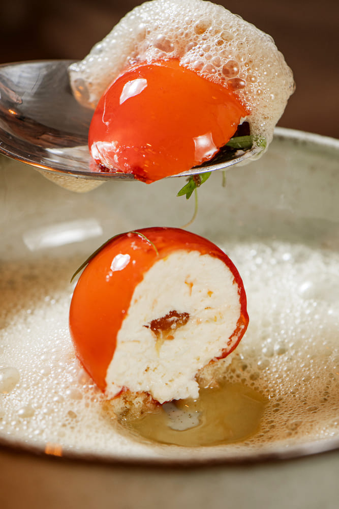 An enticing dessert made with Cointreau, hazelnut, and compote, from One-MICHELIN-Star Casa 201 in Rio de Janeiro. © Alex Woloch/Casa 201