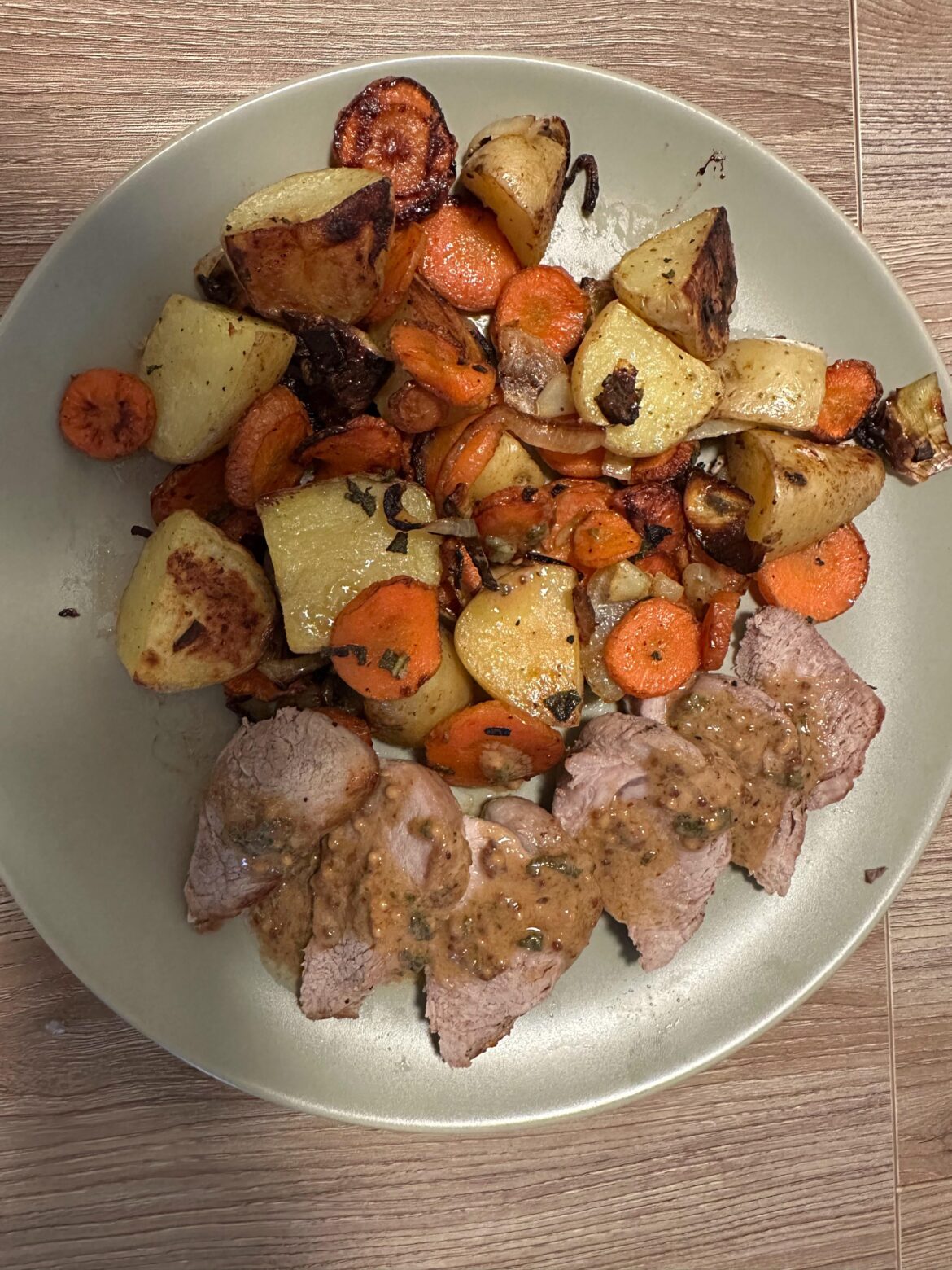 Sheep pan, pork tenderloin, and veggies. 🤤