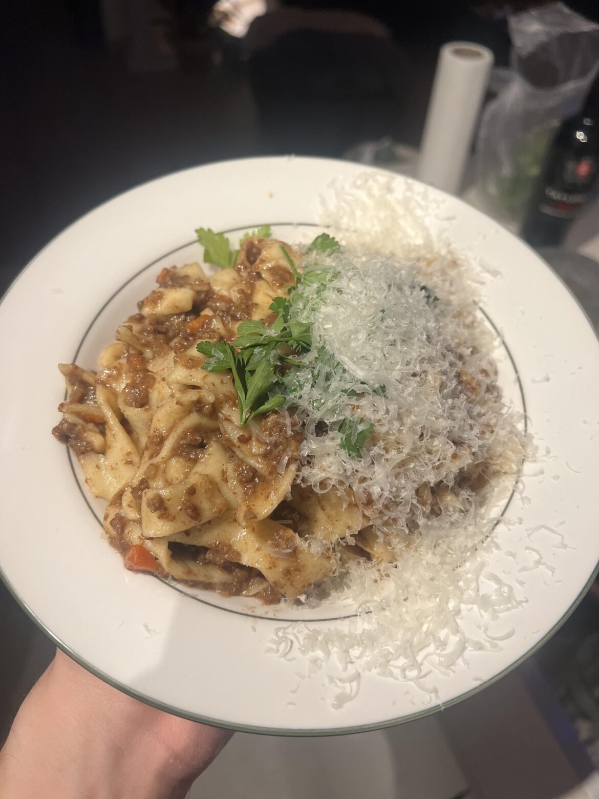 Homemade pasta, ragu, parsley and parm on top