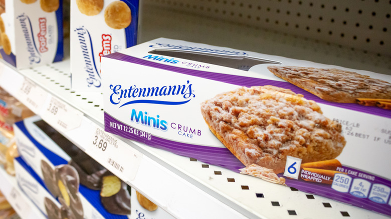 A box of Entenmann's Crumb Cake Minis on a supermarket shelf