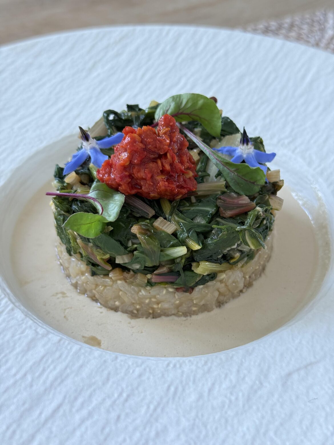 Swiss chard, rice, tahini sauce, harissa