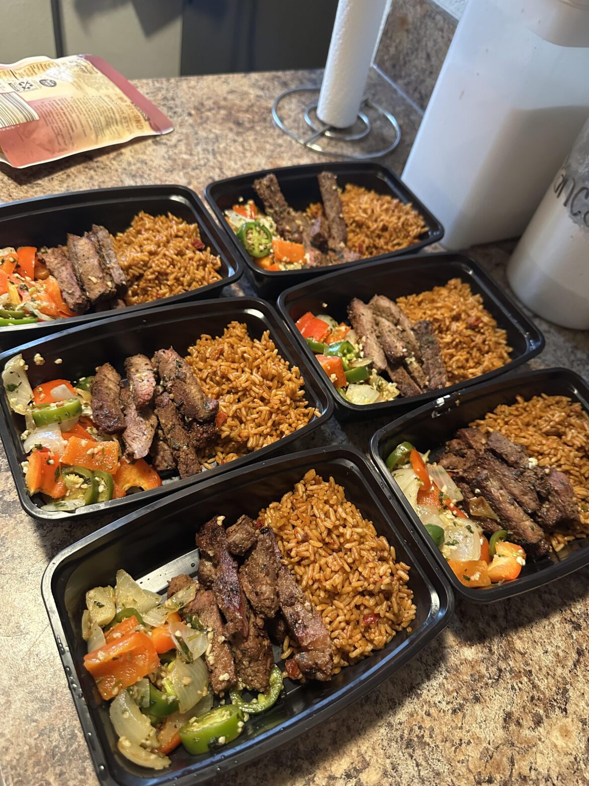 steak, spanish rice, and some mixed veggies. (bell pepper, onion, jalapeño, and some cilantro)