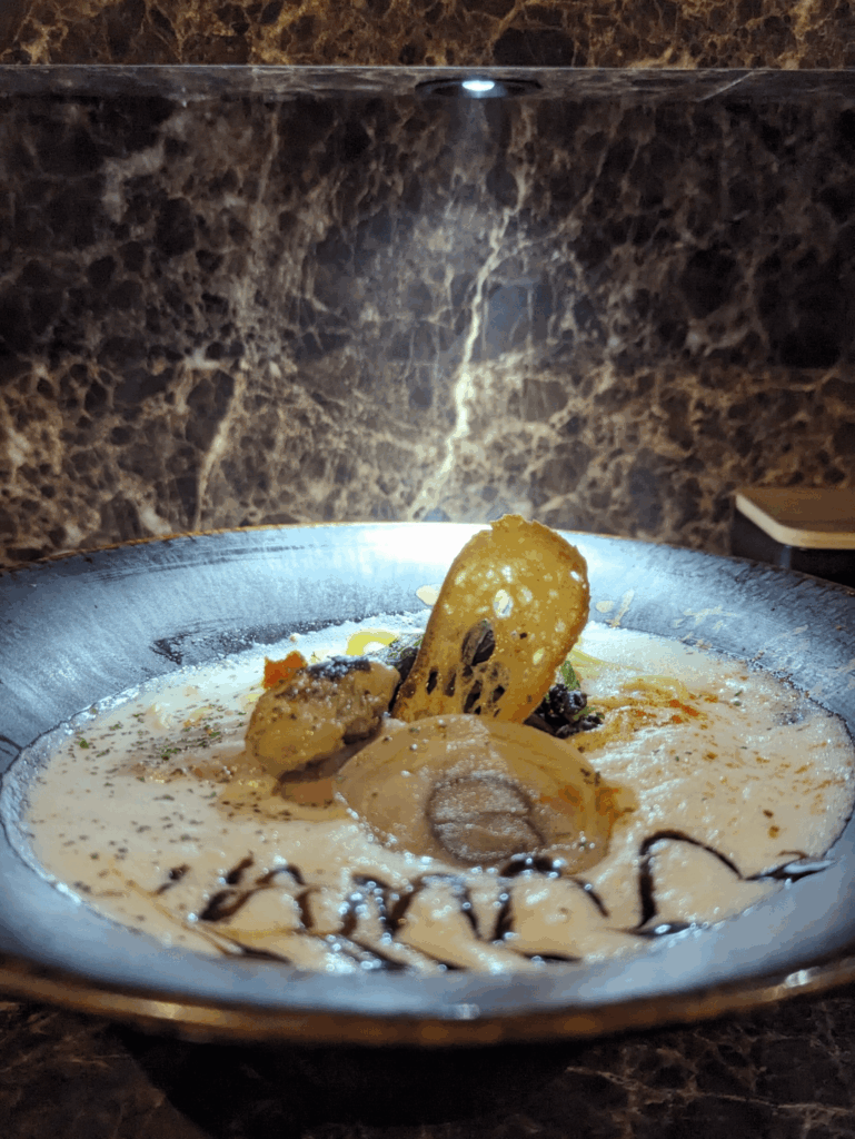 Oyster ramen with espuma broth and balsamic reduction, "Transforming now" near Nakano broadway