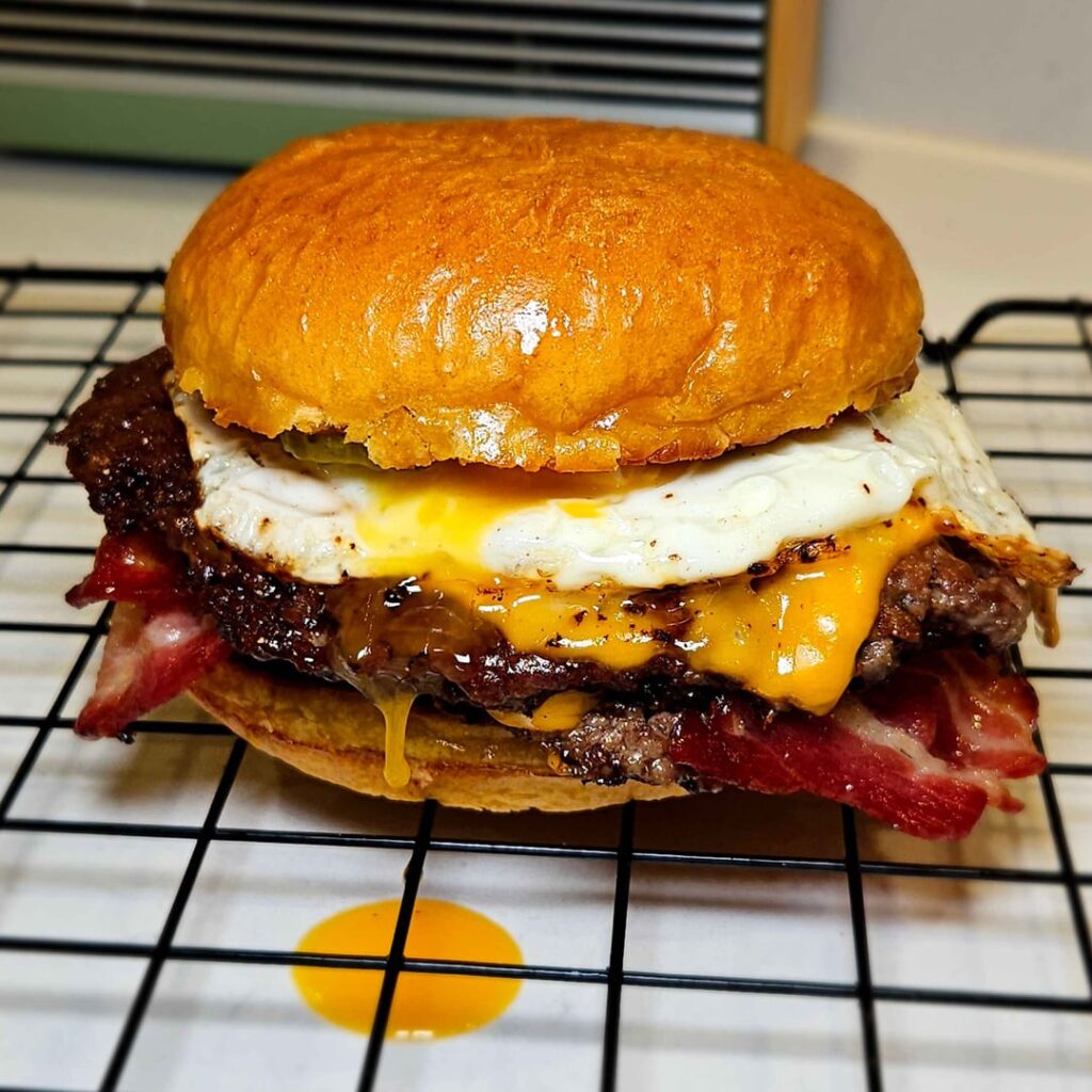 Bacon double cheeseburger with a fried egg