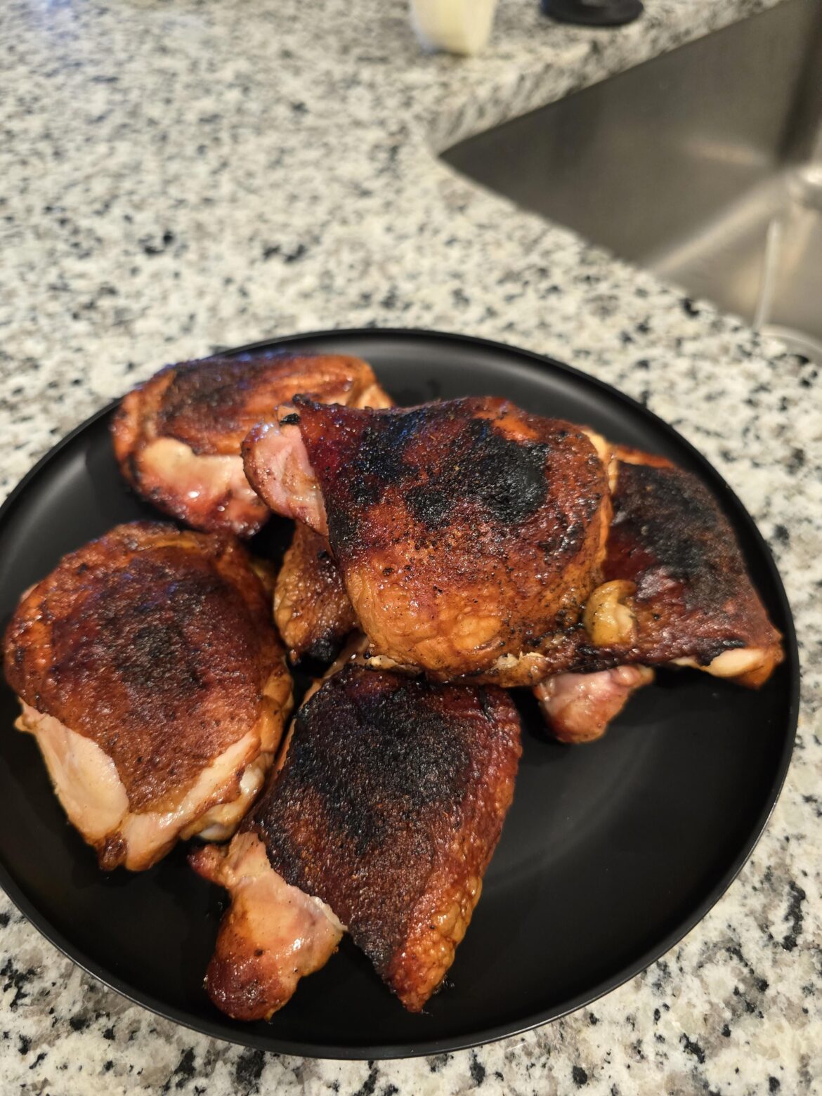 Smoked and seared chicken thighs searwood