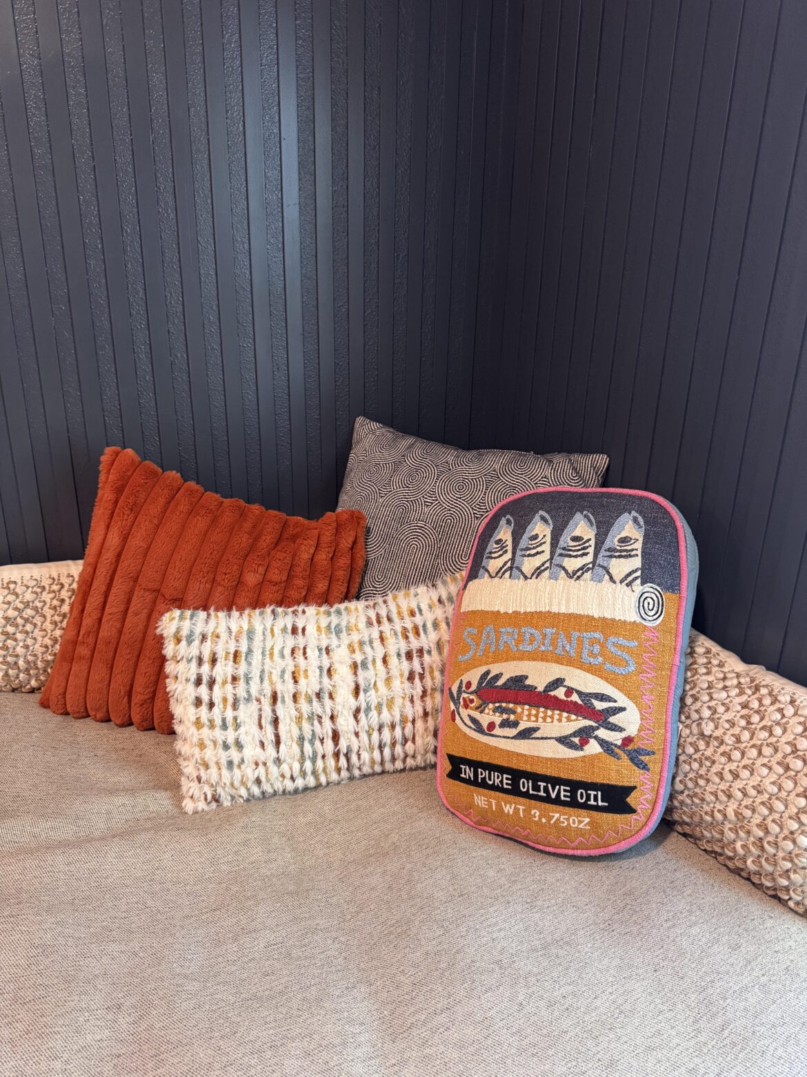Decorative pillow my wife purchased because of my love for sardines