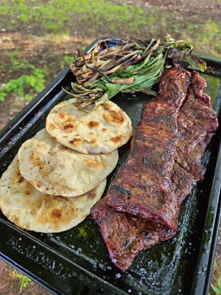 Skirt steak and ramp tacos over open fire